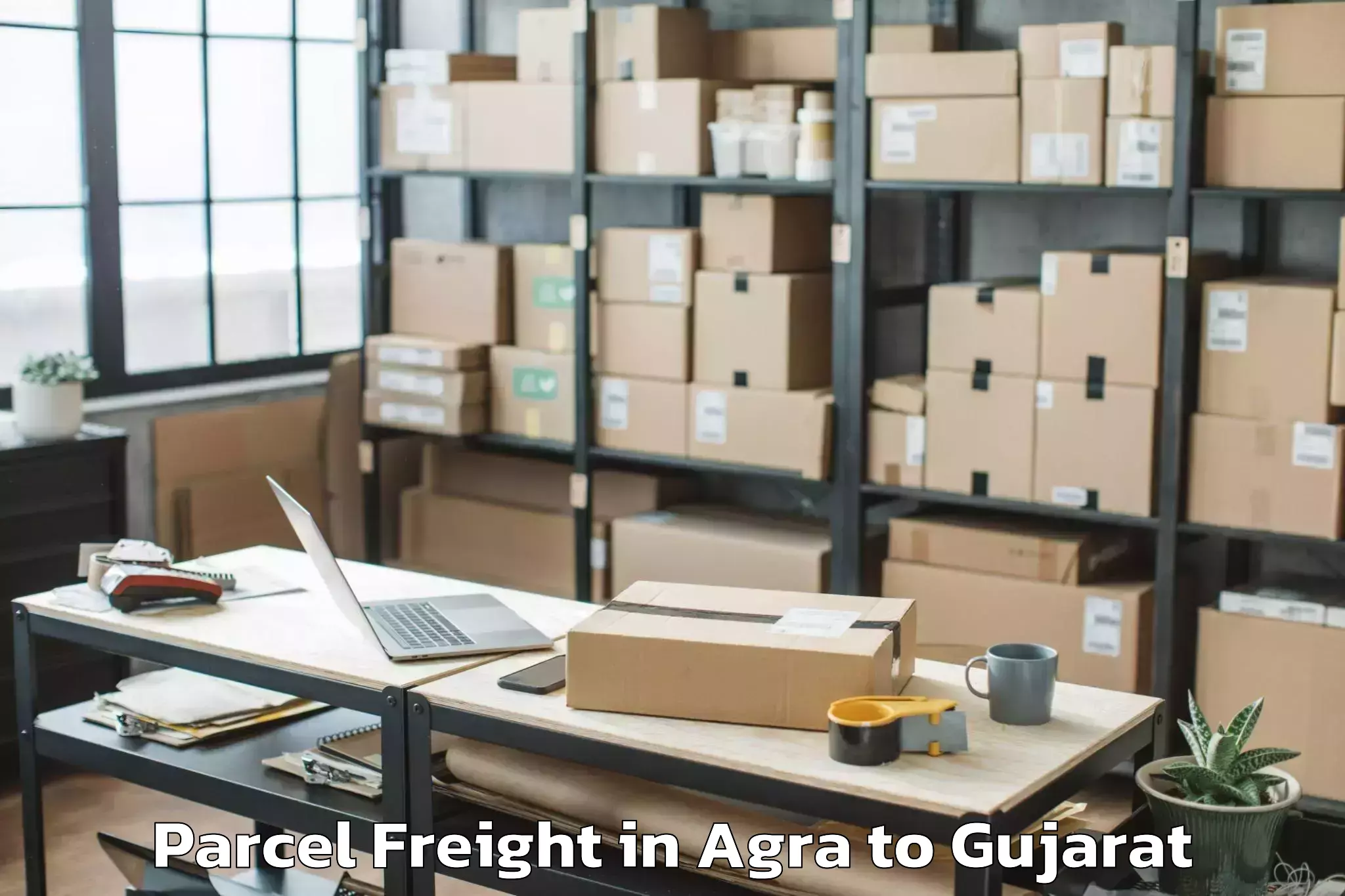 Discover Agra to Amroli Parcel Freight